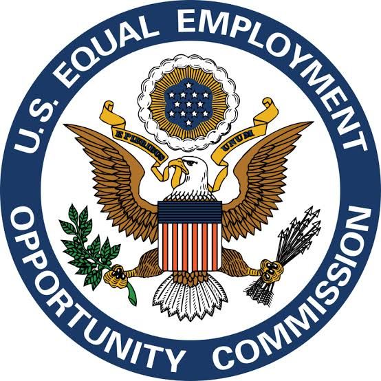 An official EEOC seal and report documentation used to represent federal workplace compliance and demographic monitoring.