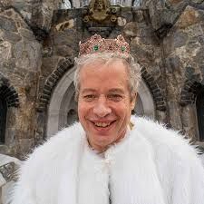 Real estate developer Chris Mark standing in front of his stone castle construction site in rural Connecticut.