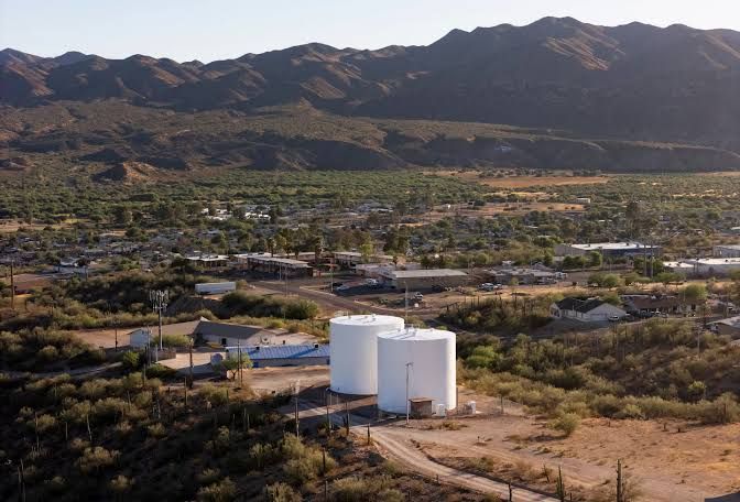 Water storage tanks on the edge of the desert town of Kearny, Arizona, during a period of extreme water scarcity.
