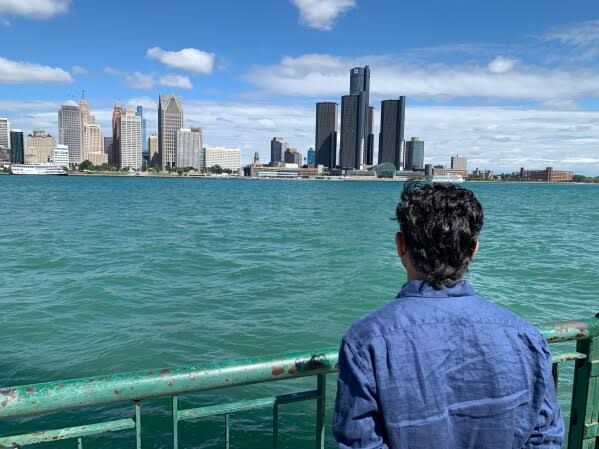 City Councillor Renaldo Agostino viewing the Detroit skyline from the Windsor, Ontario riverfront.