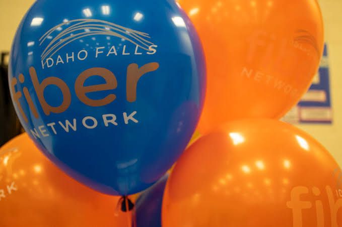 City of Idaho Falls fiber optic network sign at a residential site during expansion.