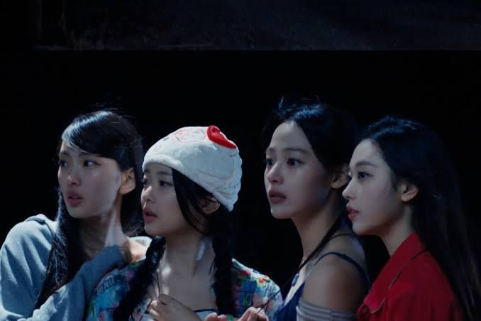 Minji, Hanni, Haerin, and Hyein of NewJeans posing for their fourth anniversary film project.