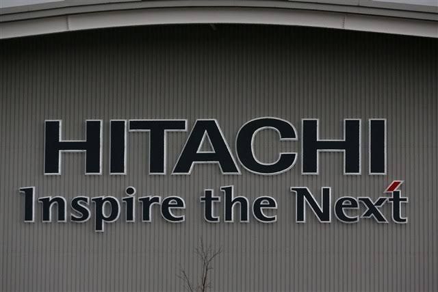 Hitachi research and development laboratory equipment during a semiconductor manufacturing process phase.
