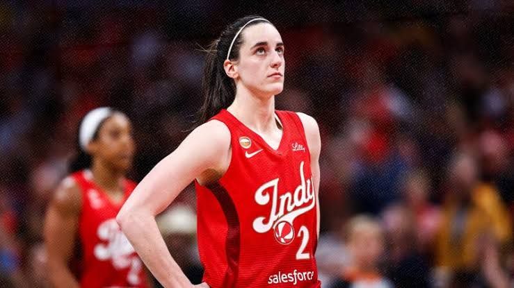Caitlin Clark playing basketball during an Indiana Fever game.