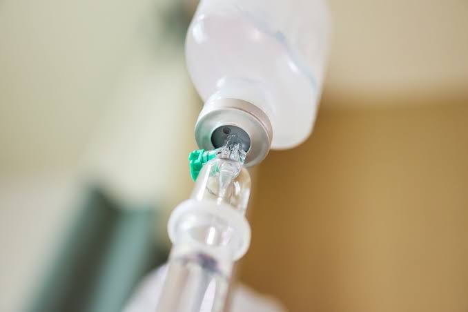 Close-up of glass medical vials in a hospital setting highlighting standard epinephrine injection containers.