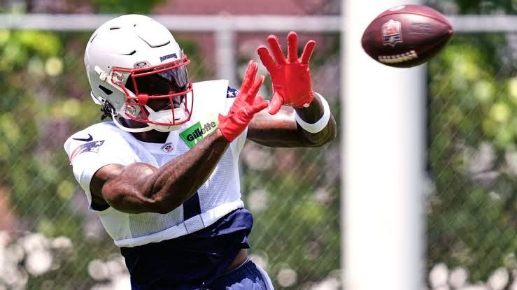 Wide receiver A.J. Brown catching a pass during New England Patriots training camp at Gillette Stadium.