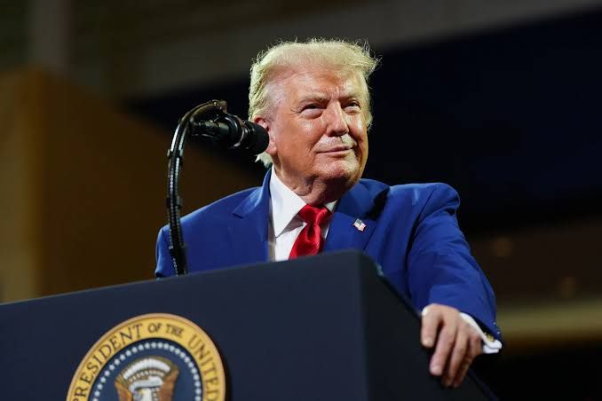 President Donald Trump speaking at a public event in Georgia regarding new administration trade policies.