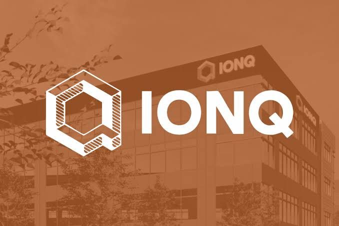 IonQ logo displayed on a solid orange background.