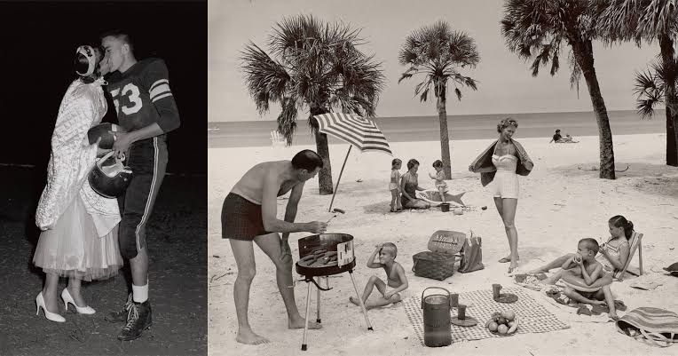 A family enjoys a picnic with hot dogs and a blanket at a Florida beach in a 1958 photograph.