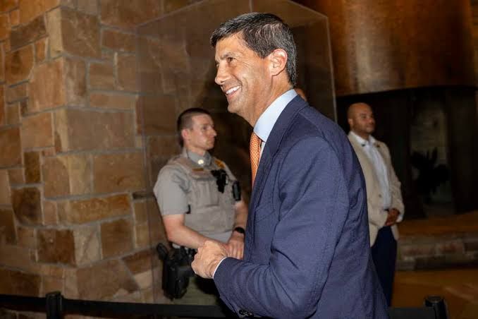 Federal Reserve Chair Kevin Warsh speaking at the Jackson Lake Lodge podium during the annual economic summit.