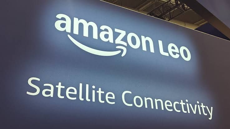 Amazon Leo satellites floating in orbit above Earth as part of the orbital deployment plan.