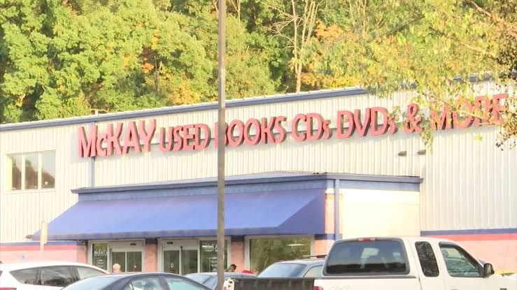 A sign displaying the name of a future local business in Knoxville managed by former book store employees.
