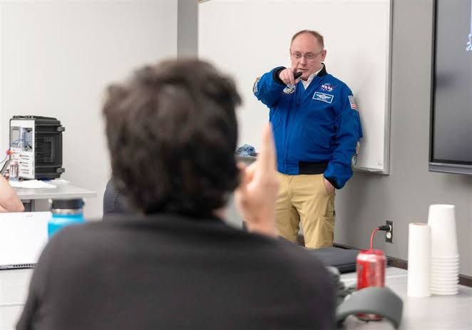 NASA astronaut Mike Fincke speaking to students at the Community College of Allegheny County during a campus visit.