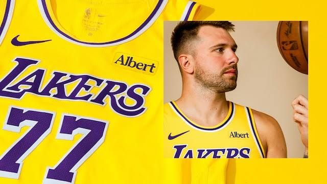 Luka Dončić wearing the Los Angeles Lakers uniform featuring the new Albert logo patch on the left chest.
