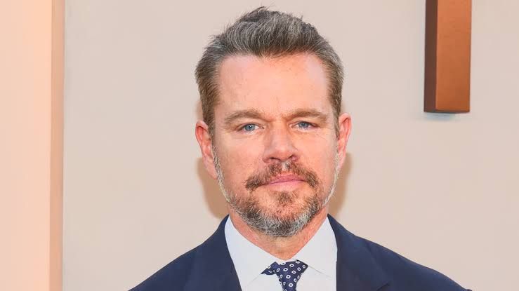 Matt Damon attends a film industry event in a dark suit while discussing his future project plans.