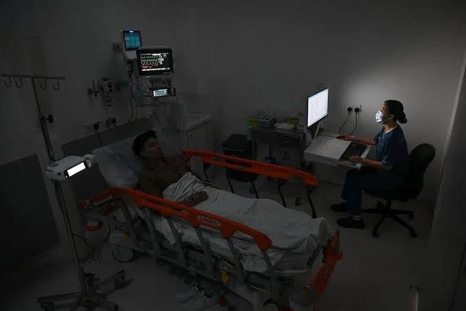 Dr. Goh Shih Ee demonstrates intravenous ketamine administration equipment at the Institute of Mental Health.