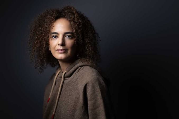 Leïla Slimani posing for a portrait in Paris while discussing her new novel I'll Take the Fire.