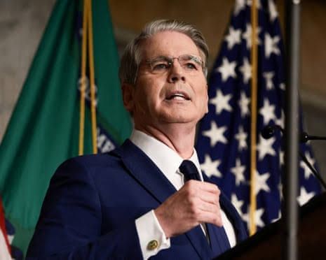 US Treasury Secretary Scott Bessent speaking at a press event, highlighting the current debate over bond market strategy.