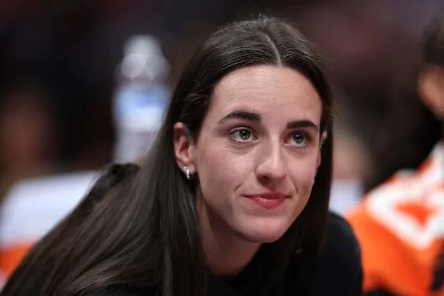 Caitlin Clark of the Indiana Fever reacts during the 2025 WNBA All-Star Game at Gainbridge Fieldhouse.
