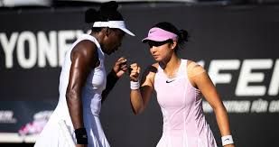 Venus Williams and Alexandra Eala standing on a grass court during the Bad Homburg tournament.