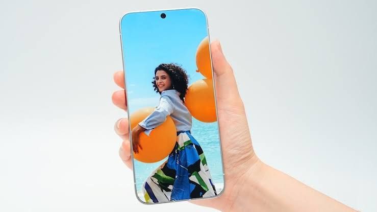 Tecno smartphone concept displaying a zero-millimeter bezel screen next to a standard phone model for comparison.