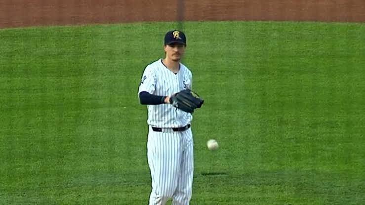 Max Fried throwing a pitch during a game for the New York Yankees.