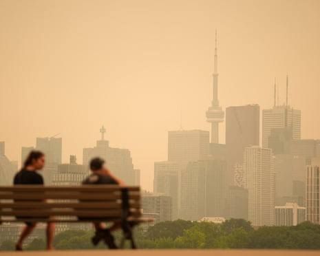 Smoke plumes rising from a forest fire near the US-Canada border.