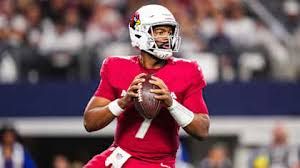 Quarterback Jacoby Brissett wearing his team practice jersey during a team training camp session.