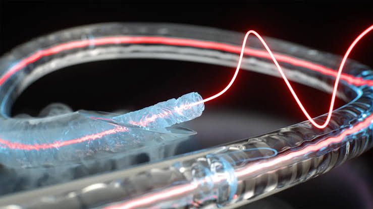 An artist's render of a frozen optical fiber core inside a glass capillary tube, showing light and sound waves.