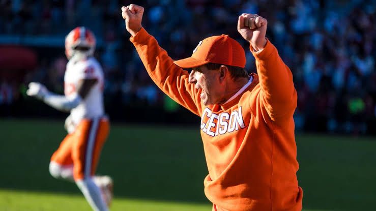 Dabo Swinney leading the Clemson Tigers in a pre-season practice session before their opening game against LSU.