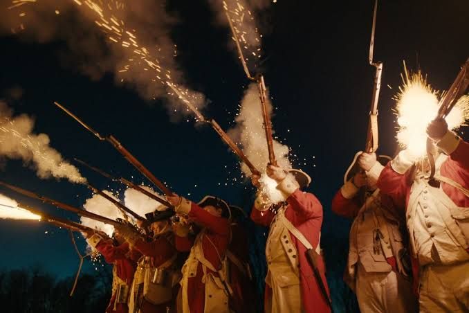 A scene from the Netflix docuseries The American Experiment featuring historical battle reenactments.