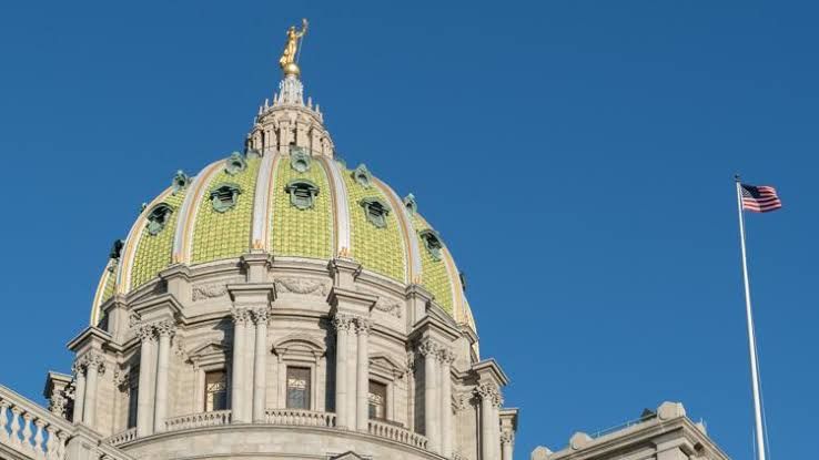 Representative Elizabeth Fiedler at the Pennsylvania state capitol discussing the new health care legislation.