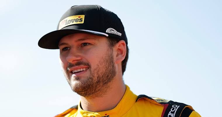 Todd Gilliland wearing his team gear during a 2026 race weekend event for Front Row Motorsports.