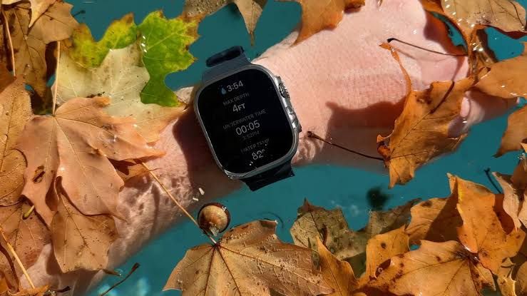 An Apple Watch Ultra on a wrist, representing the wearable devices now exempt from EU replaceable battery regulations.