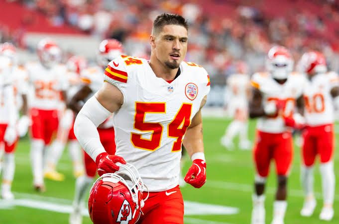 Leo Chenal in a Kansas City jersey during a game, representing his transition to the Washington Commanders defense.