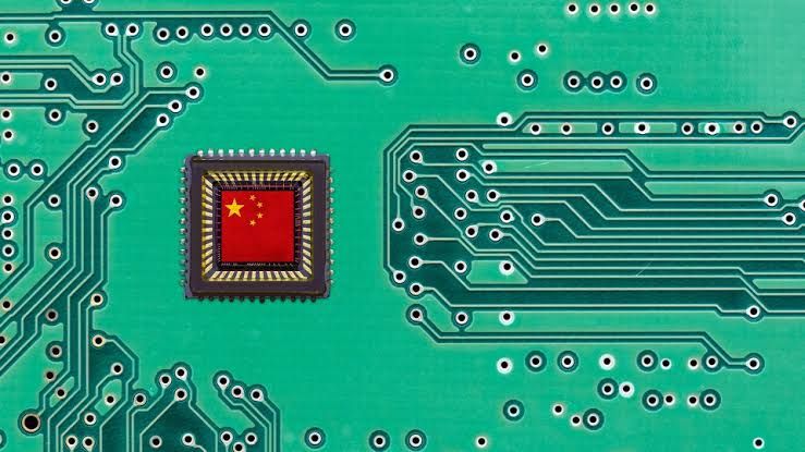 Chinese flag superimposed over a glowing green computer circuit board representing the domestic tech sector.