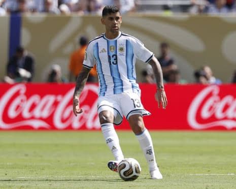 Cristian Romero wearing the Tottenham Hotspur kit during a match at Tottenham Hotspur Stadium.