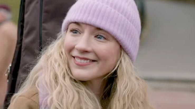 Emily Kinney as Beth Greene singing in a bar during an alternate reality scene on The Walking Dead: Dead City.