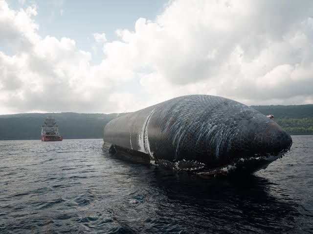 SpaceX Starship upper stage from Flight 13 floating in the Indian Ocean near Christmas Island before recovery.
