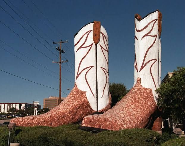 The Giant Justins, a 35-foot-tall cowboy boot sculpture, standing outside the North Star Mall in San Antonio.