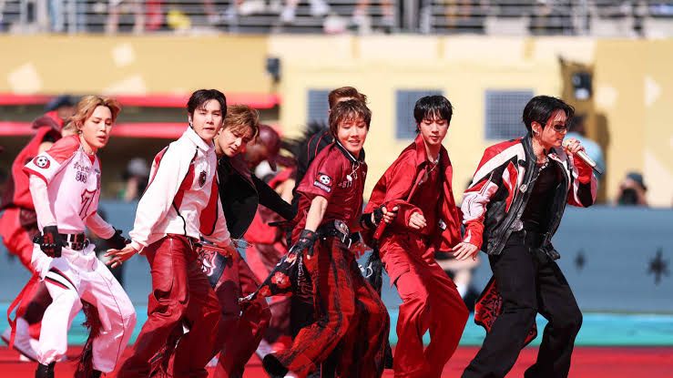 BTS performing on stage at the 2026 FIFA World Cup final in East Rutherford, New Jersey.
