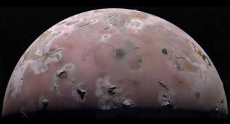 Juno spacecraft capturing data on Jupiter’s moon Io during a close flyby to measure surface temperatures.