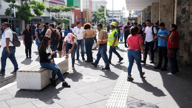 People evacuate a building in San Salvador after a 7.4-magnitude earthquake occurred off the coast of Chiapas, Mexico.