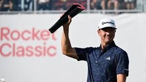 Michael Thorbjornsen celebrates his win at the 18th hole of the Rocket Classic in Detroit.