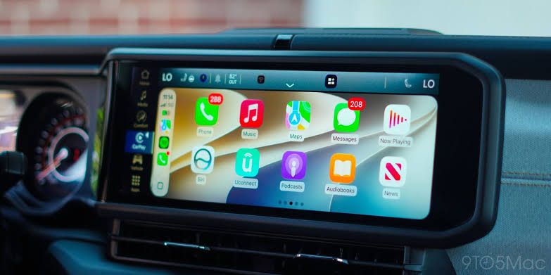 CarPlay interface display showing the iOS 27 dashboard with media controls and new navigation settings.