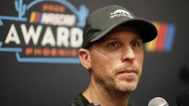 Denny Hamlin speaks to reporters during NASCAR Champions week at the JW Marriott Desert Ridge Resort.