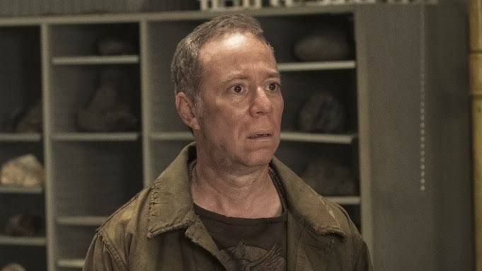 Kevin Sussman and Lauren Lapkus standing together in a scene from the television show Stuart Fails to Save the Universe.