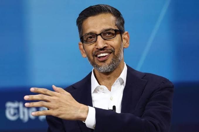 Sundar Pichai during a formal event discussing Google's corporate strategy and infrastructure investments.
