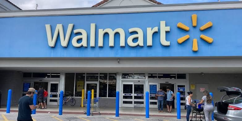 Shoppers enter a Walmart store in Hallandale Beach, Florida.