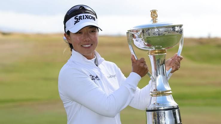 Jenny Shin holding her trophy after winning the Women's Scottish Open at Dundonald Links in Troon, Scotland.